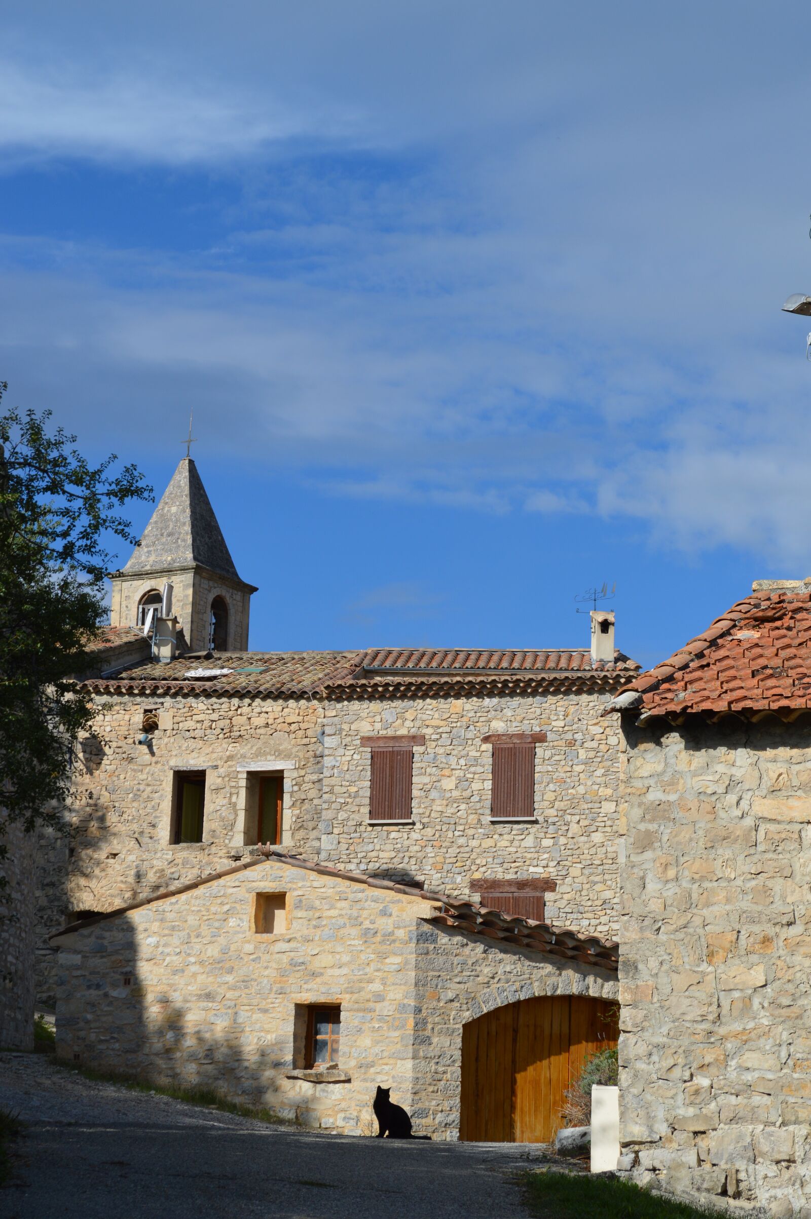 Nikon D3200 sample photo. Bell tower, village, houses photography