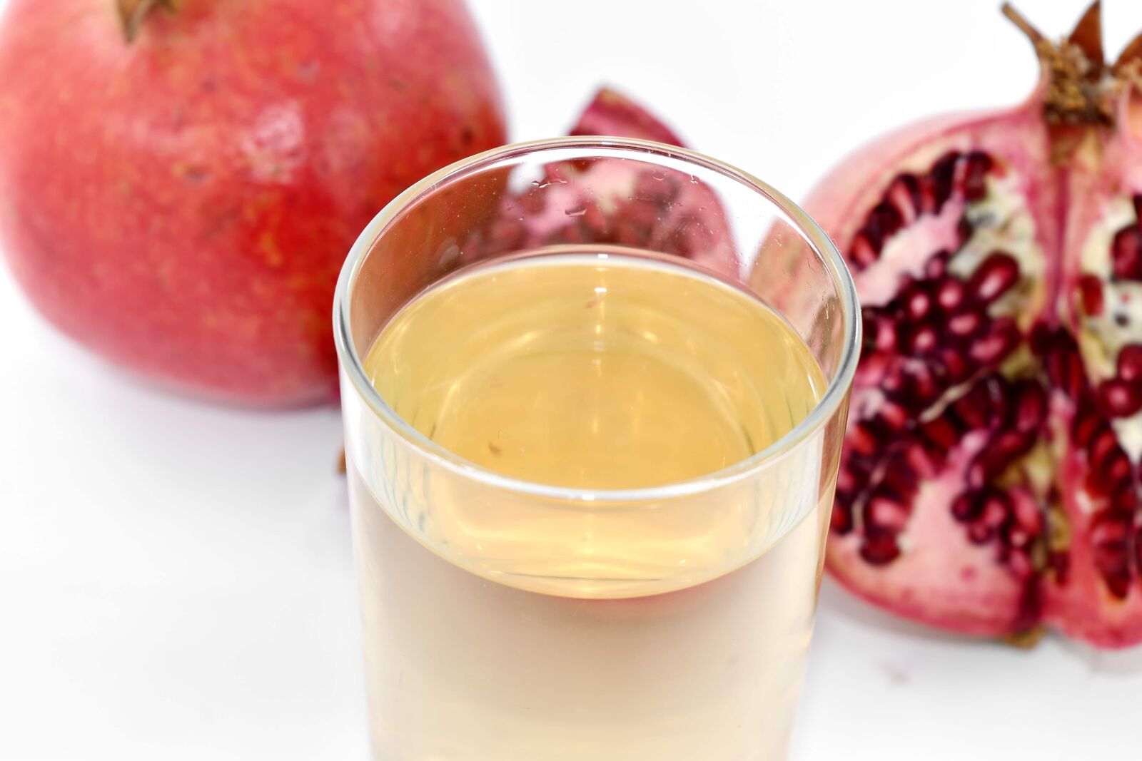 Nikon D5500 sample photo. Juice, liquid, pomegranate, syrup photography