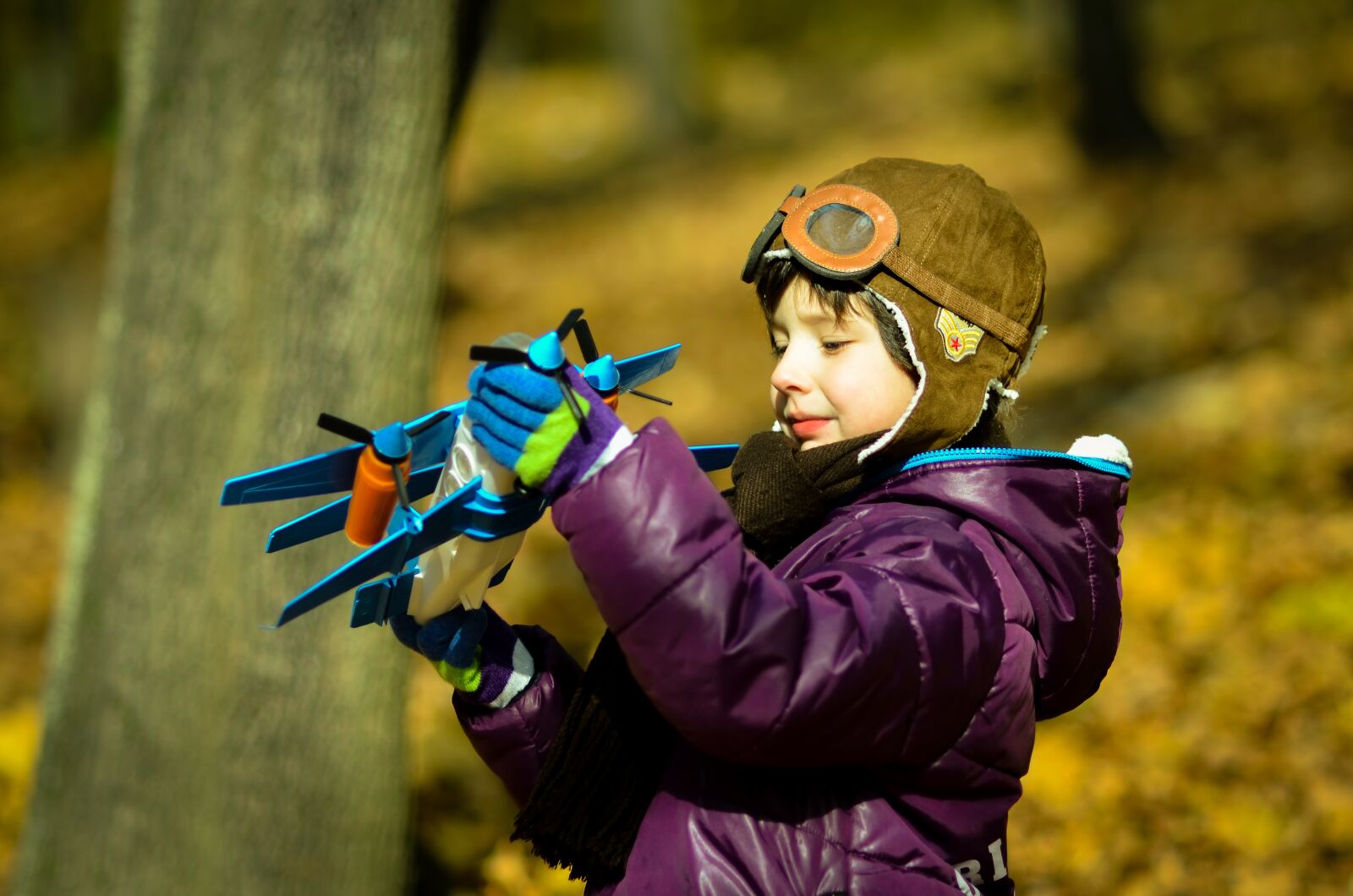 Nikon D7000 sample photo. Boy, plane, helmet photography