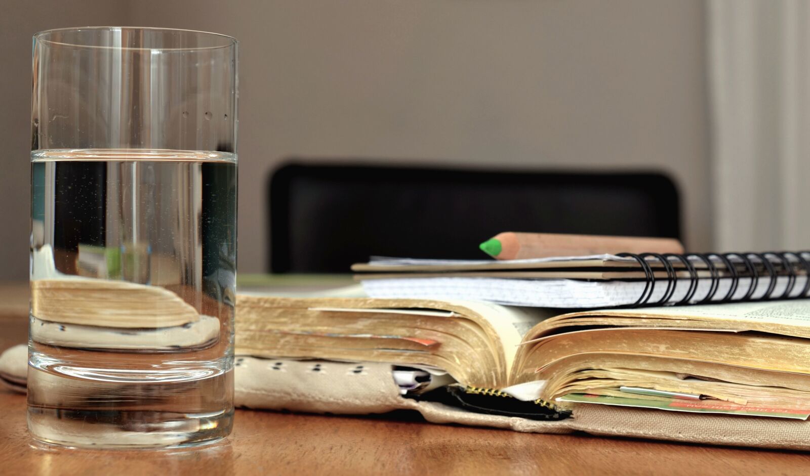 Nikon D5100 sample photo. Glass, water, notes, table photography
