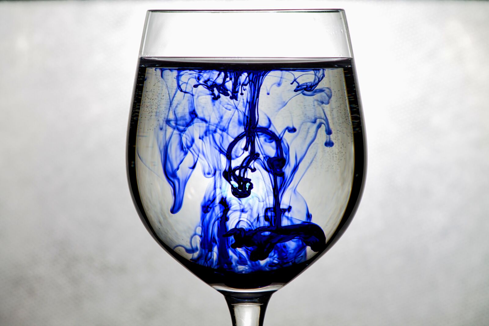 Canon EOS 1100D (EOS Rebel T3 / EOS Kiss X50) sample photo. Ink, glass, blue photography