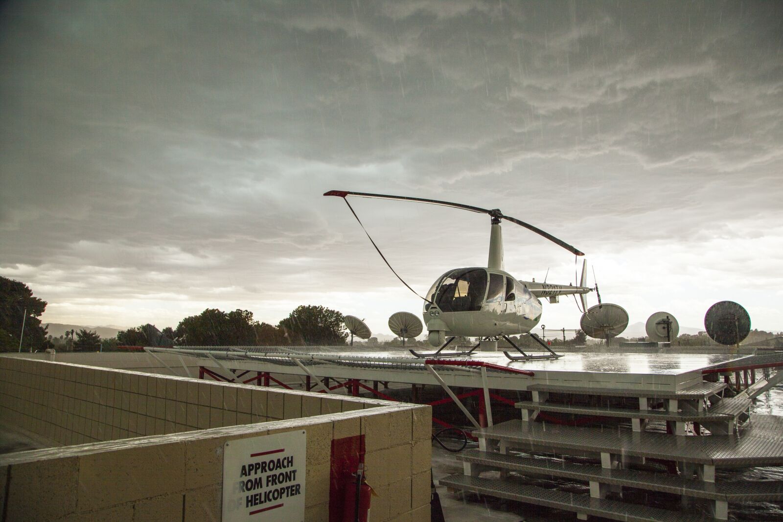 Canon EOS 5D Mark II sample photo. Helicopter in rain, stormy photography
