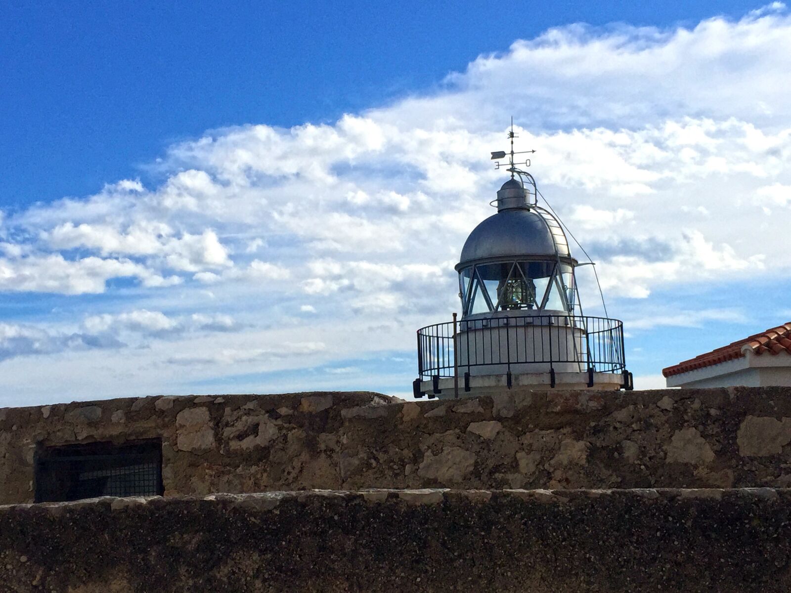 Apple iPhone 6 sample photo. Lighthouse, sky, clouds photography