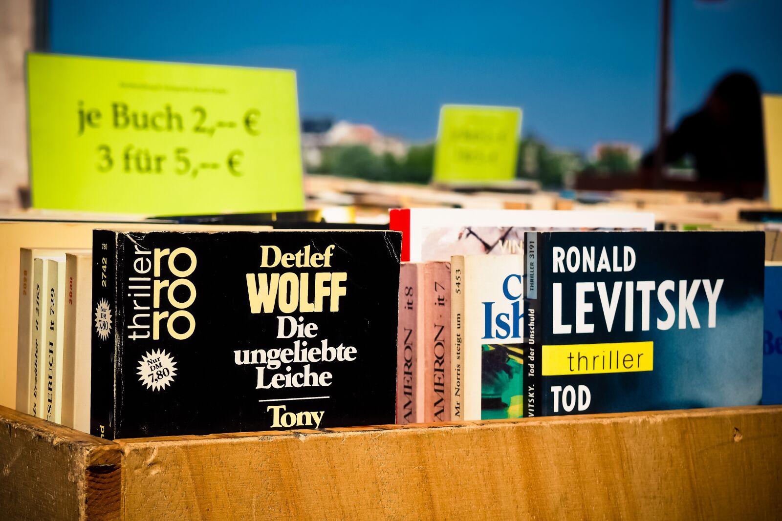 Olympus OM-D E-M10 sample photo. Books, sale, close up photography