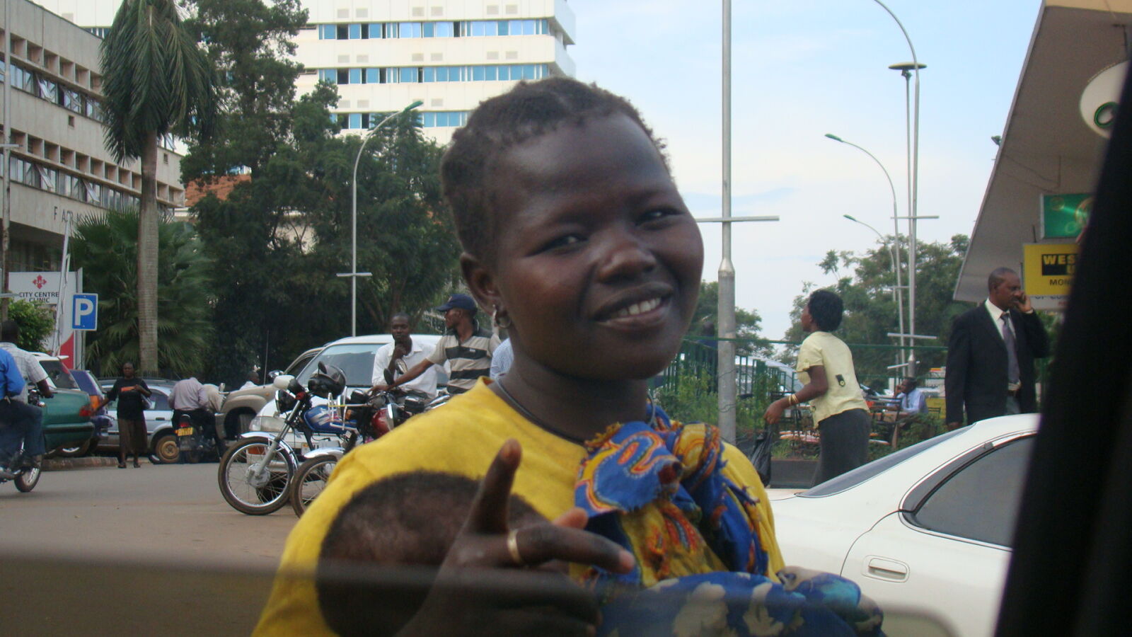 Sony Cyber-shot DSC-H50 sample photo. African, beggar, kampala, karamoja photography