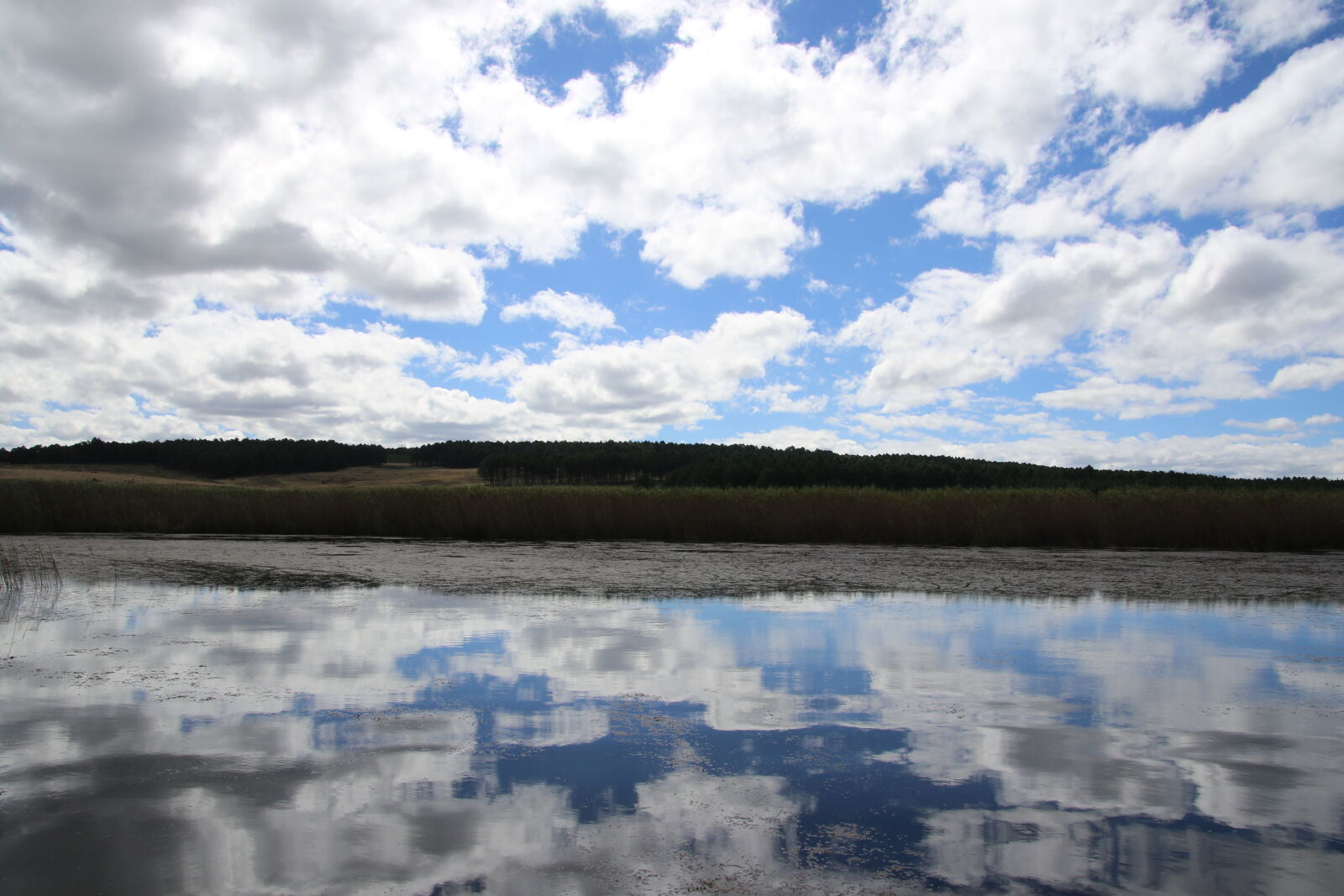 Canon EOS 7D Mark II sample photo. Blue, sky, clouds, dam photography