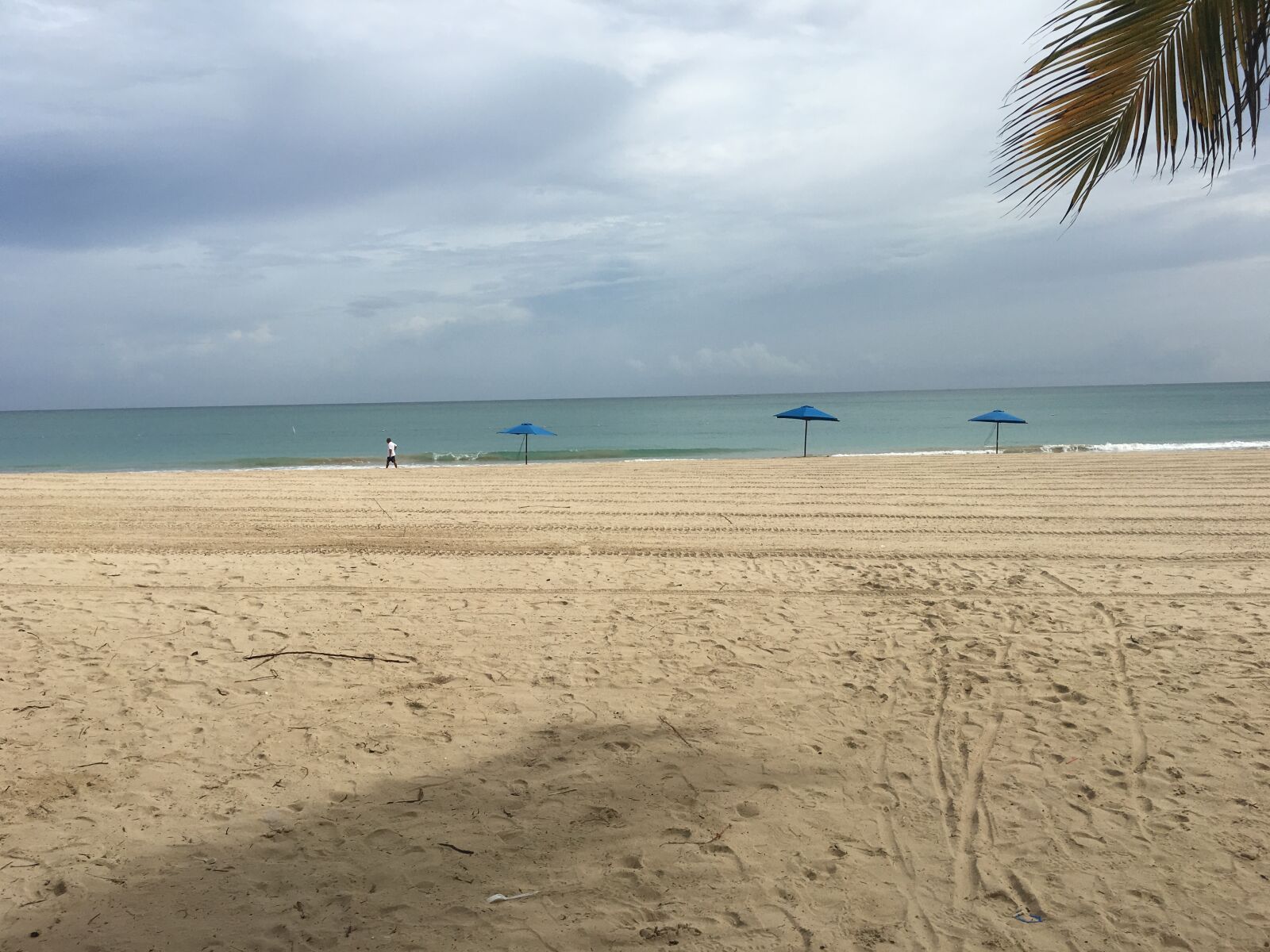 Apple iPhone 6s Plus sample photo. Beach, umbrella, sand photography