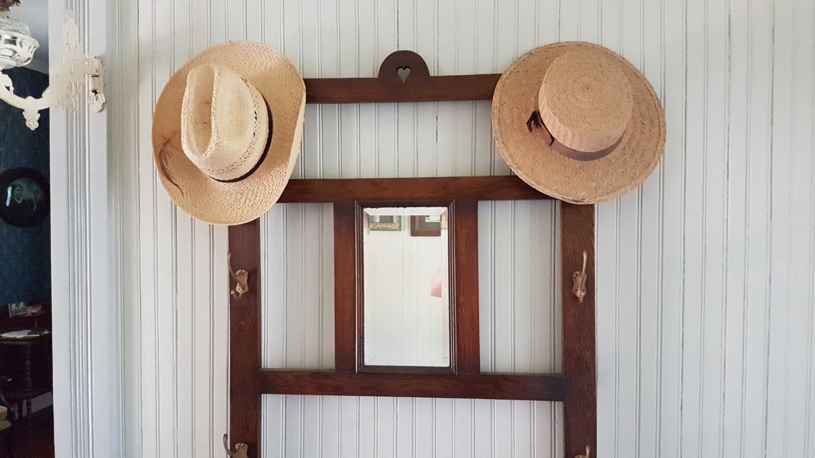 Samsung Galaxy S7 Edge sample photo. Cowboy hat, hanger, indoor photography