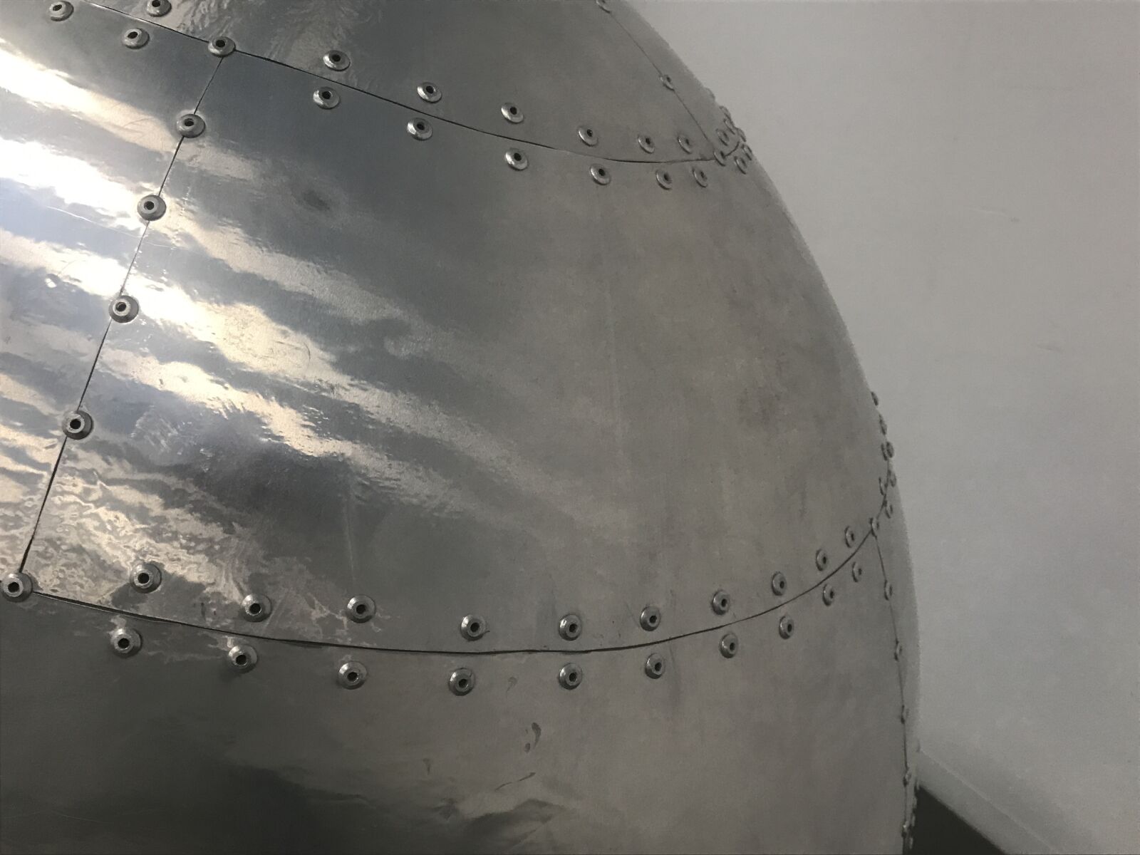 iPhone 7 back camera 3.99mm f/1.8 sample photo. Chair rivet metal, design photography