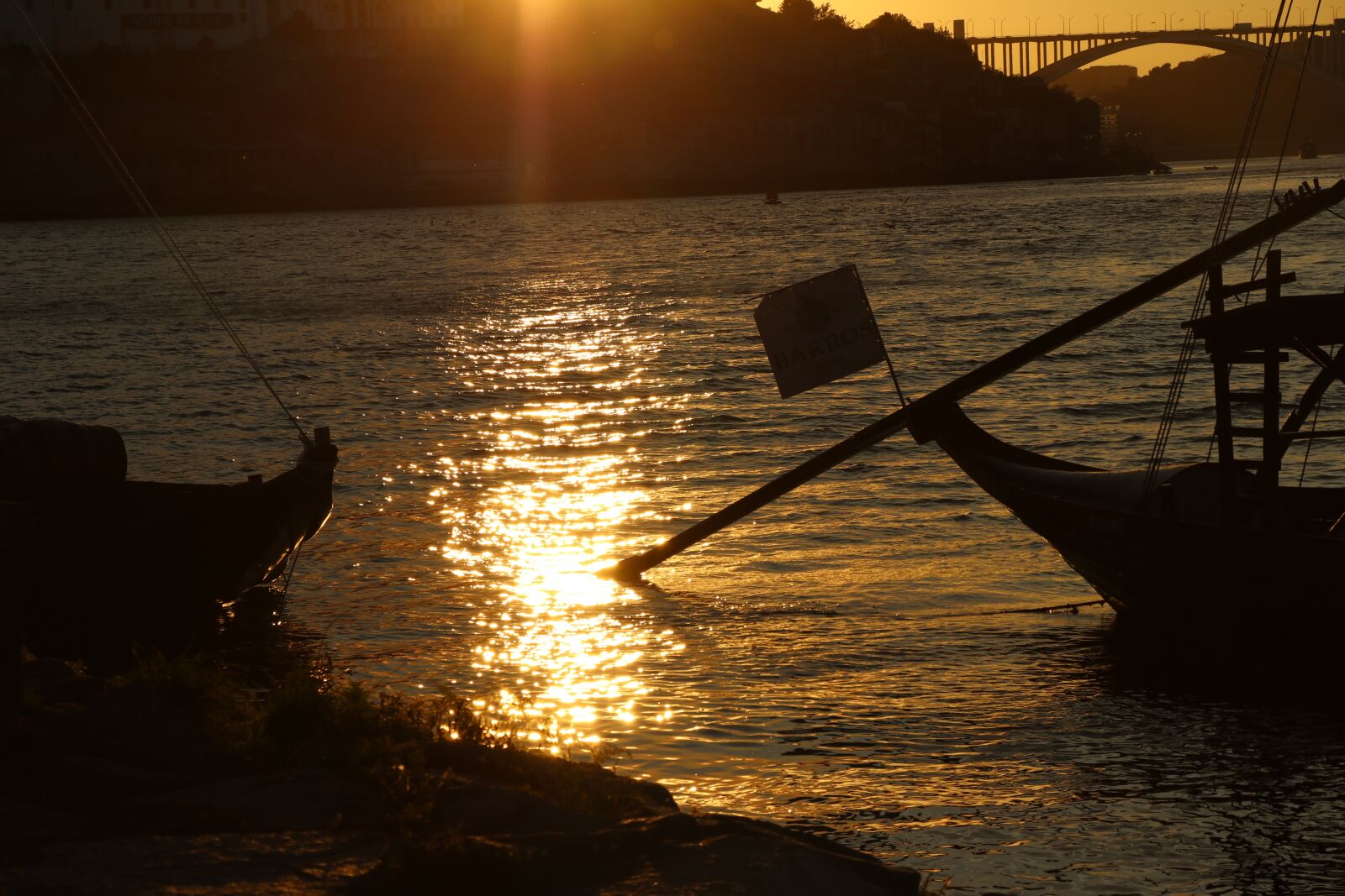 Canon EF-S 18-135mm F3.5-5.6 IS USM sample photo. River, boats, sunset photography