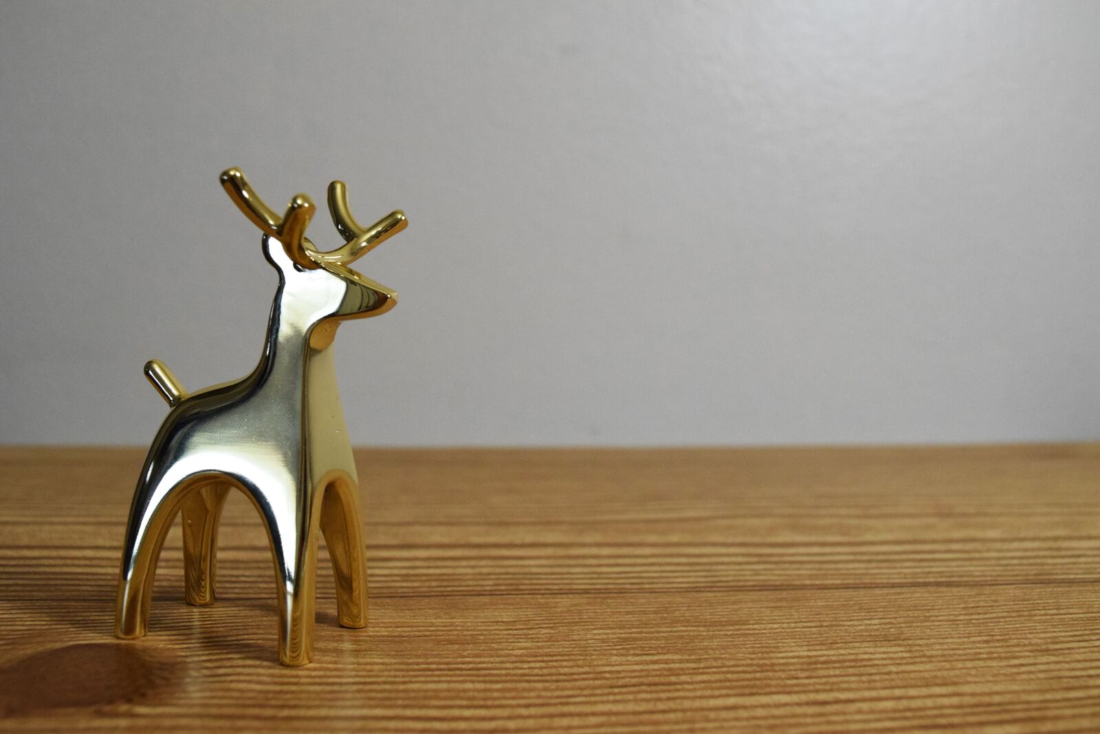 Nikon D3300 sample photo. Gold deer, wood, christmas photography