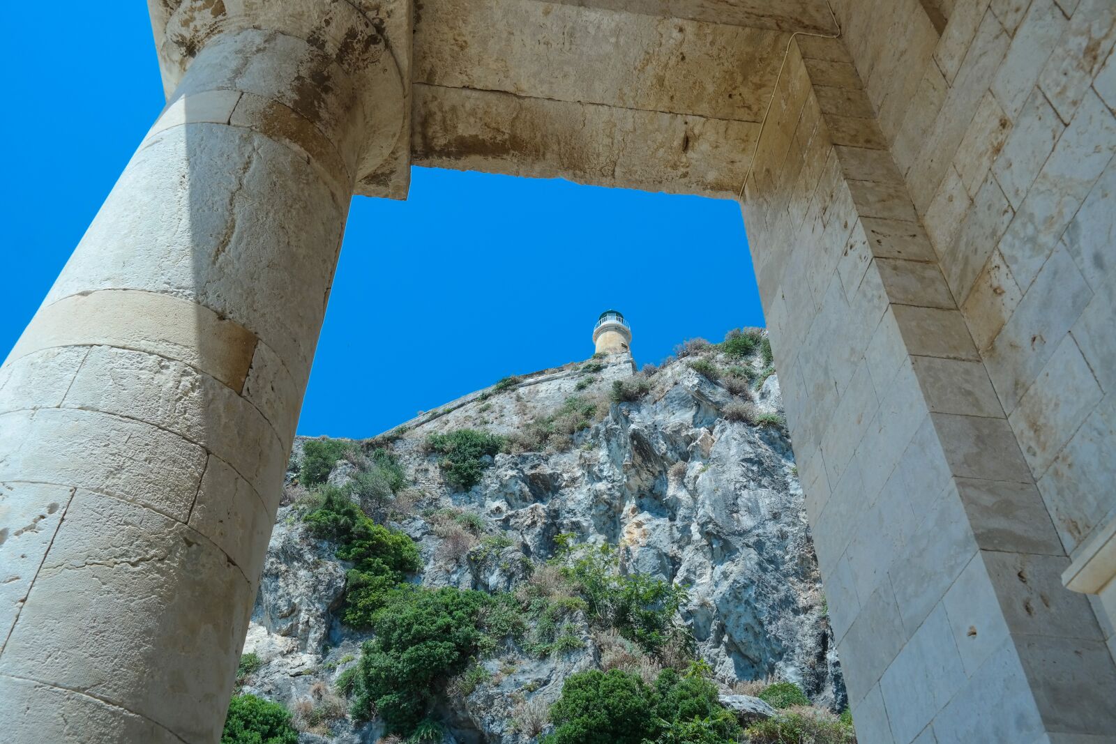 Samsung NX300 sample photo. Lighthouse, sky, rock photography