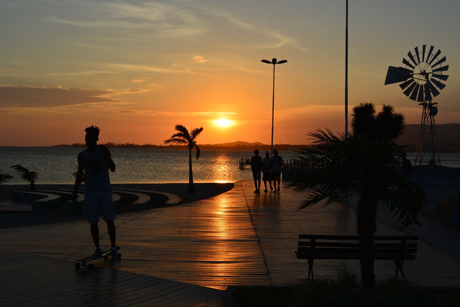 Nikon D5200 sample photo. Sunset, body of water photography