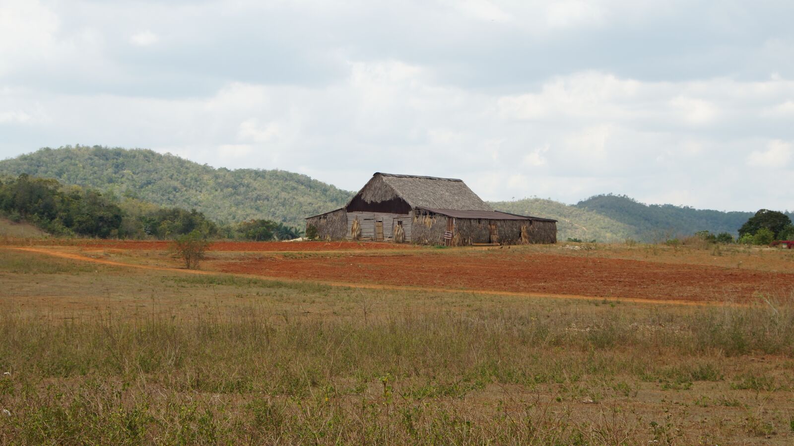 Sony SLT-A57 sample photo. Cigar, house, landscape photography