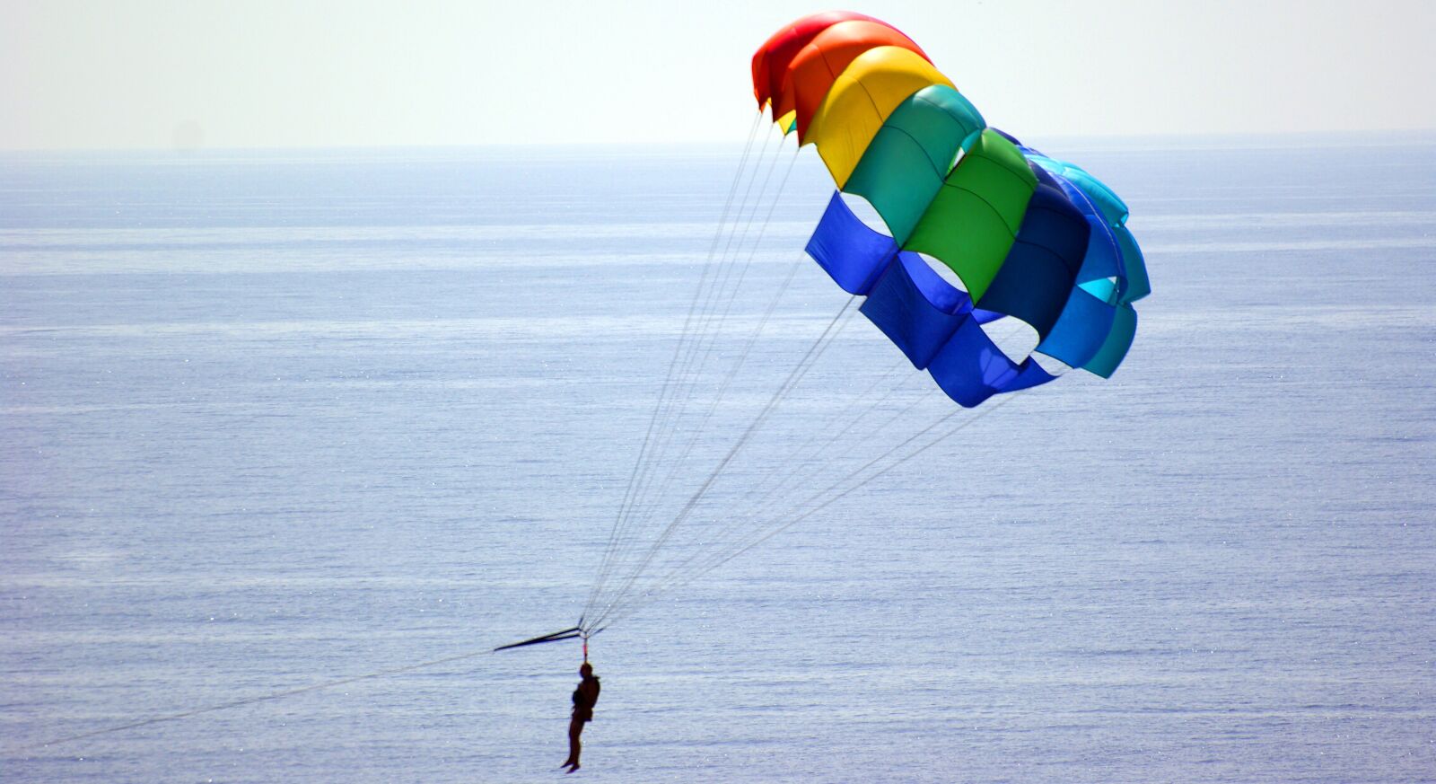 Sony Alpha DSLR-A350 sample photo. Parachute, sea, sky photography