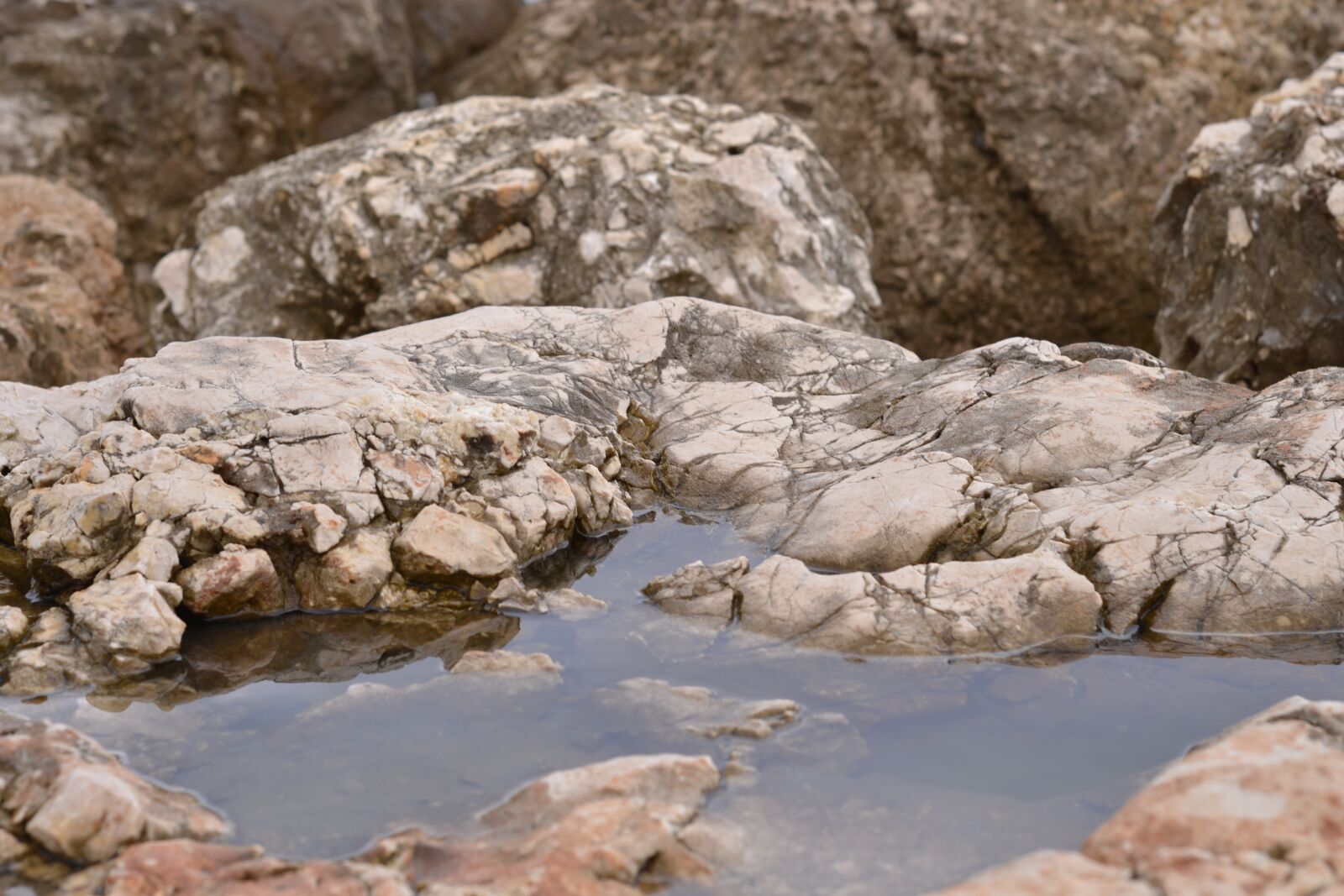 Nikon D3100 sample photo. Stones, water, reflection photography