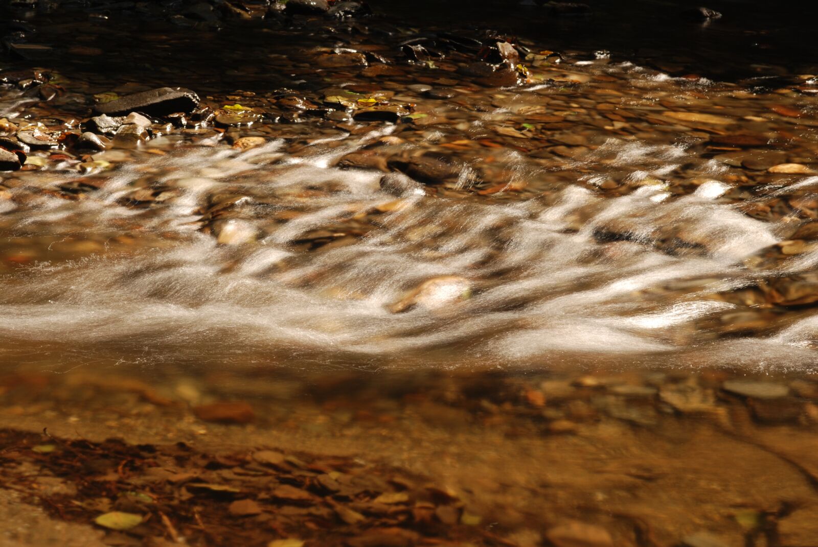 Nikon D80 sample photo. Bach, pebble, water photography
