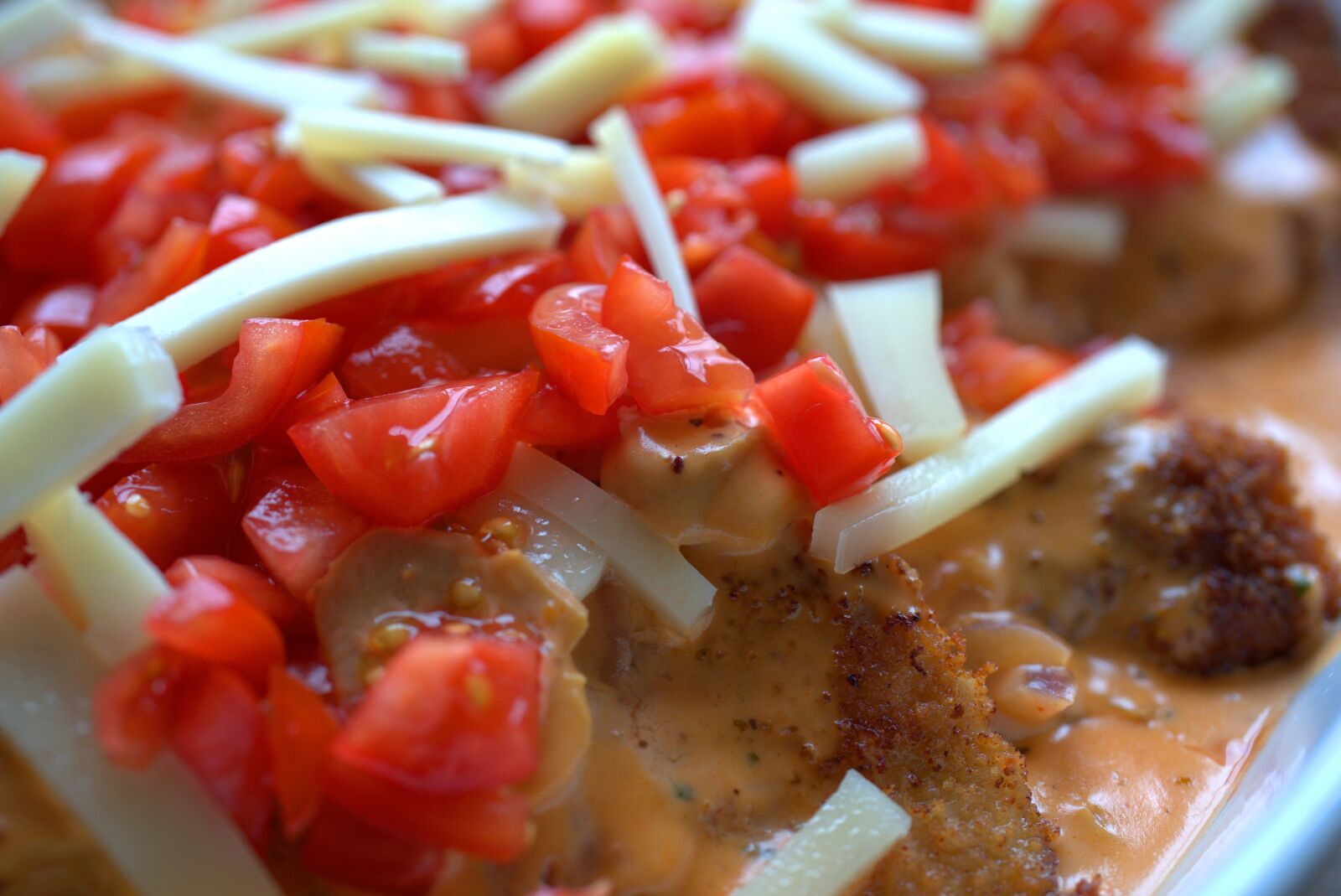 Sony FE 50mm F2.8 Macro sample photo. Tomato, cheese, schnitzel photography