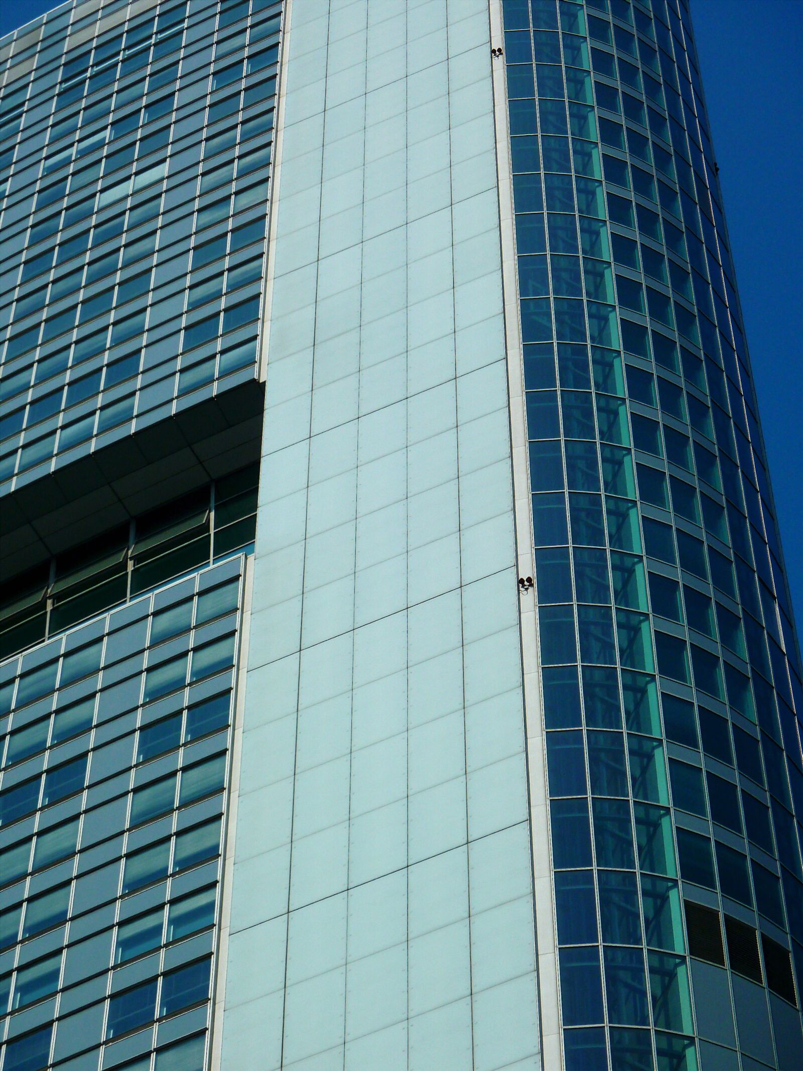 Panasonic DMC-TZ7 sample photo. Window, facade, skyscraper photography