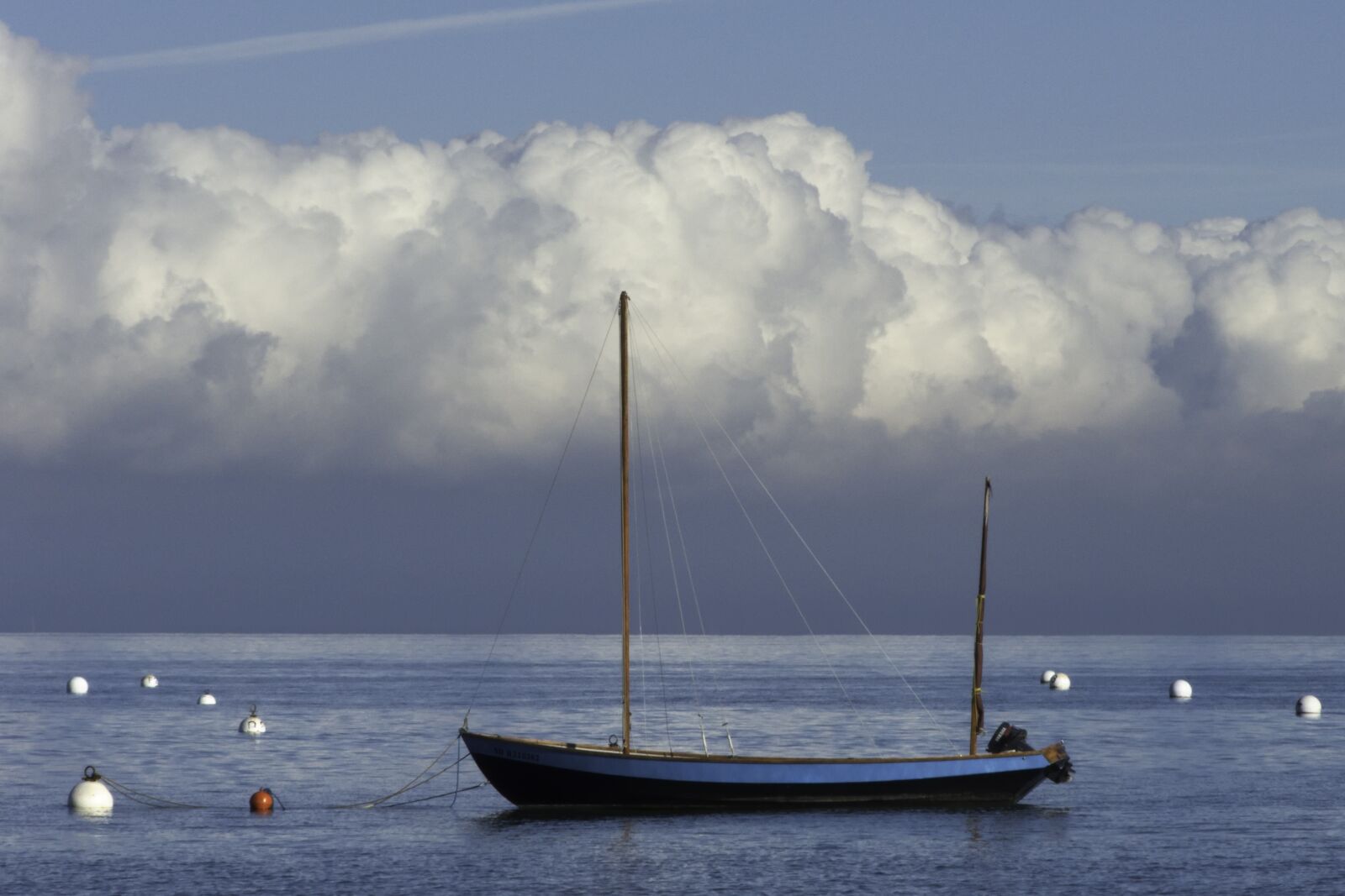 Panasonic DMC-FZ18 sample photo. Sea, boat buoys, clouds photography
