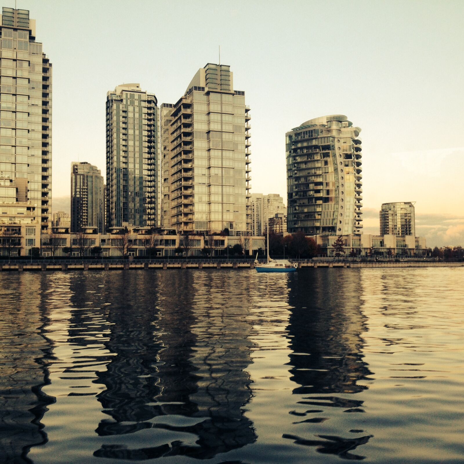 iPhone 4S back camera 4.28mm f/2.4 sample photo. Buildings, skyline, water photography