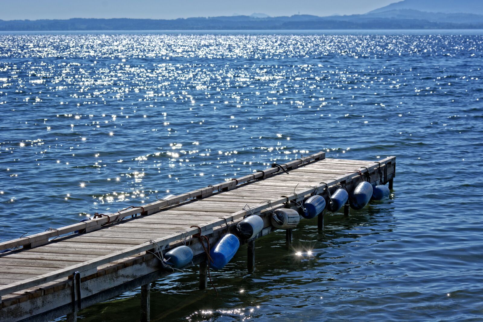 55.0-200.0mm f/4.0-f/5.6 sample photo. Sunlight, mirroring, water photography
