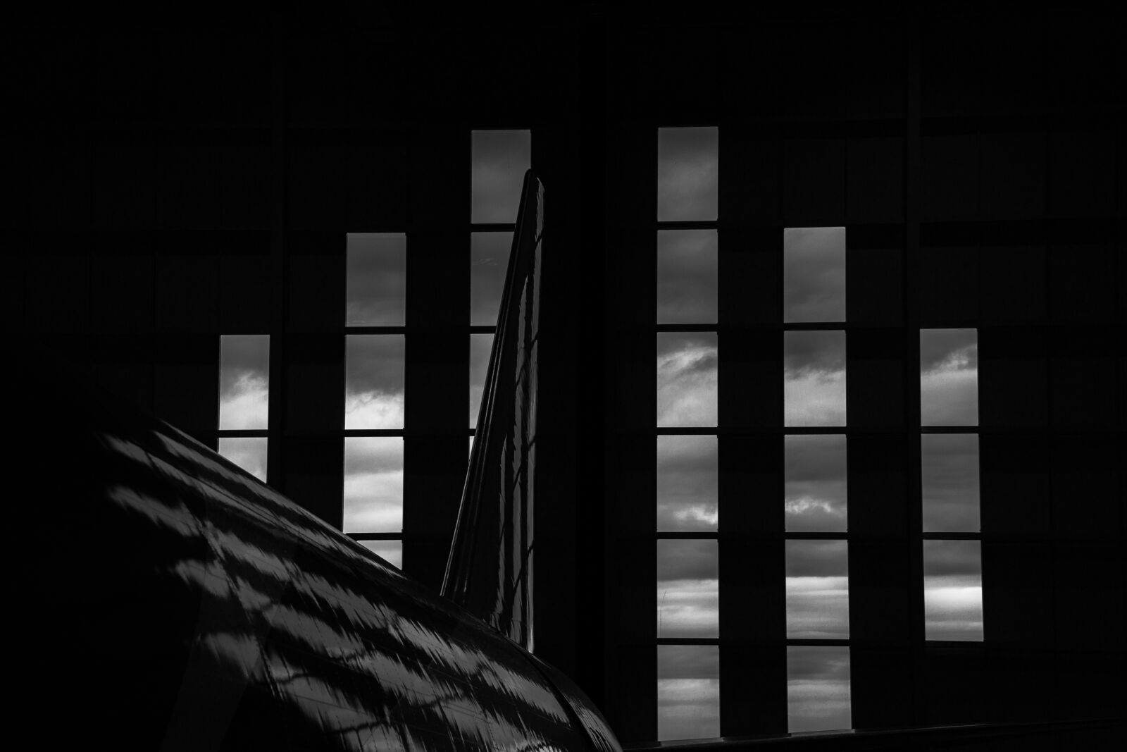 Canon EOS 60D sample photo. Airplane, evening, hangar photography