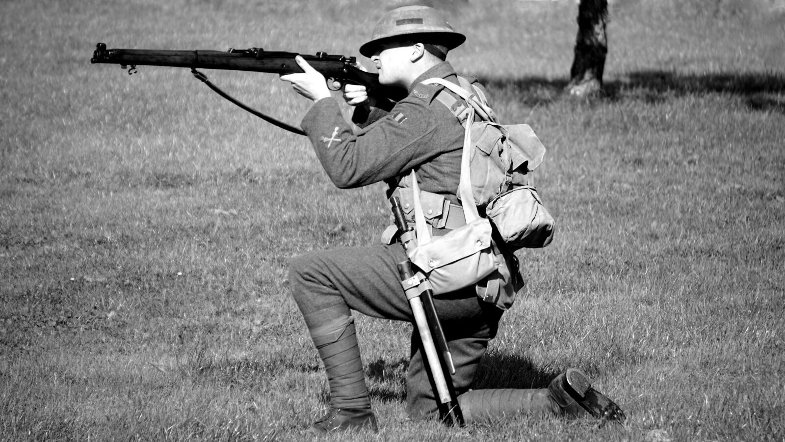 Sony E 55-210mm F4.5-6.3 OSS sample photo. Soldier, gun, military photography