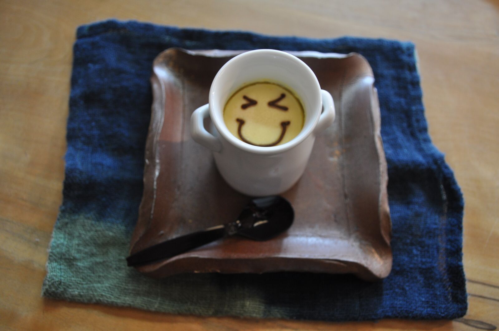 Nikon D5000 sample photo. Pudding, indigo, spoon photography