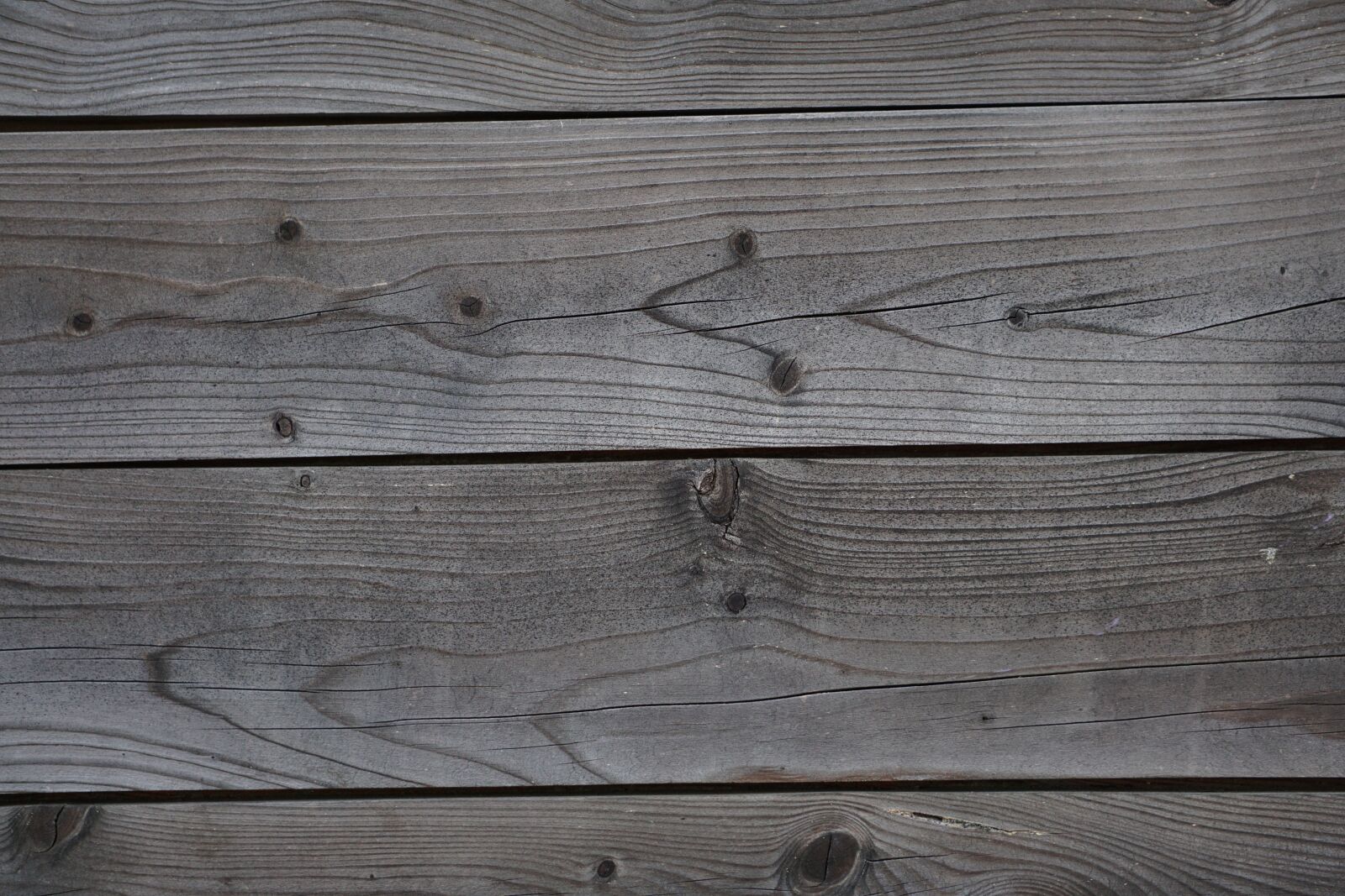 Sony E 55-210mm F4.5-6.3 OSS sample photo. Wood, wooden beams, bar photography