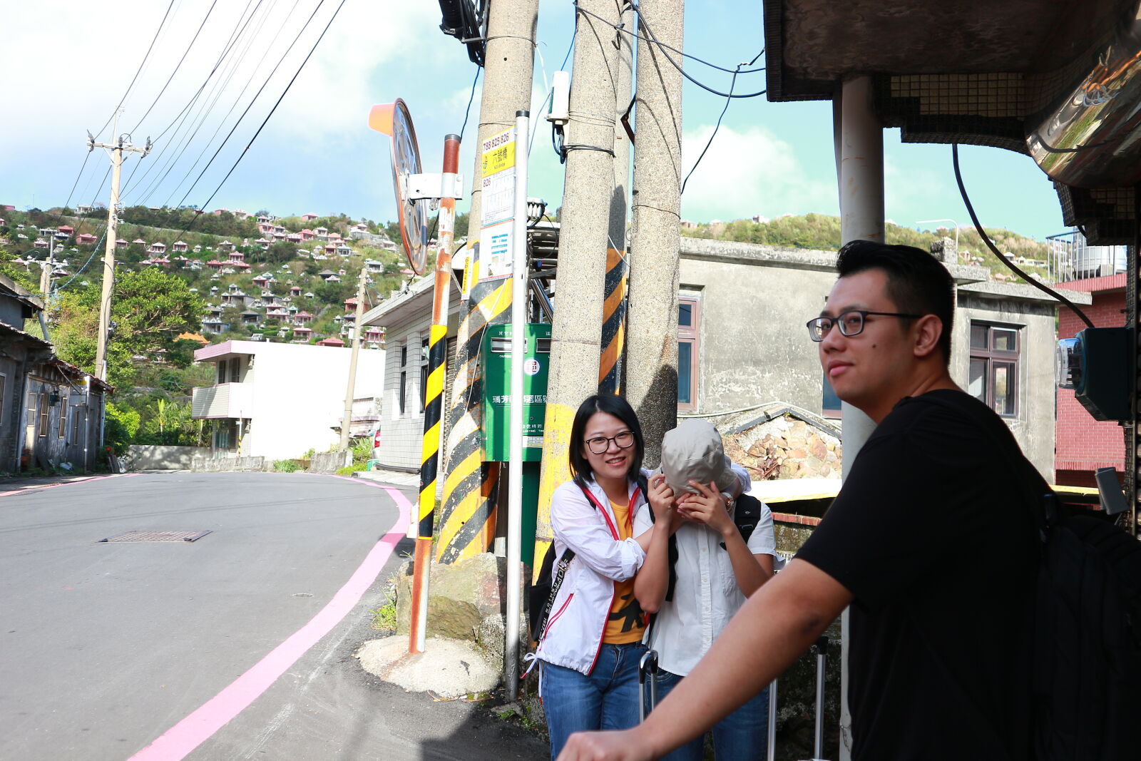 Canon EOS M sample photo. Woman, smiling, while, standing photography