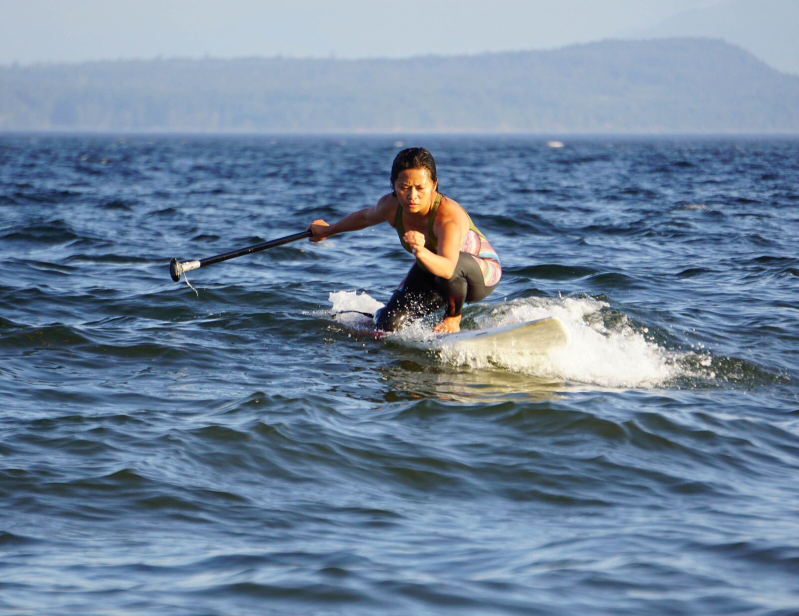 Sony E 55-210mm F4.5-6.3 OSS sample photo. Surfer, paddleboard, water photography