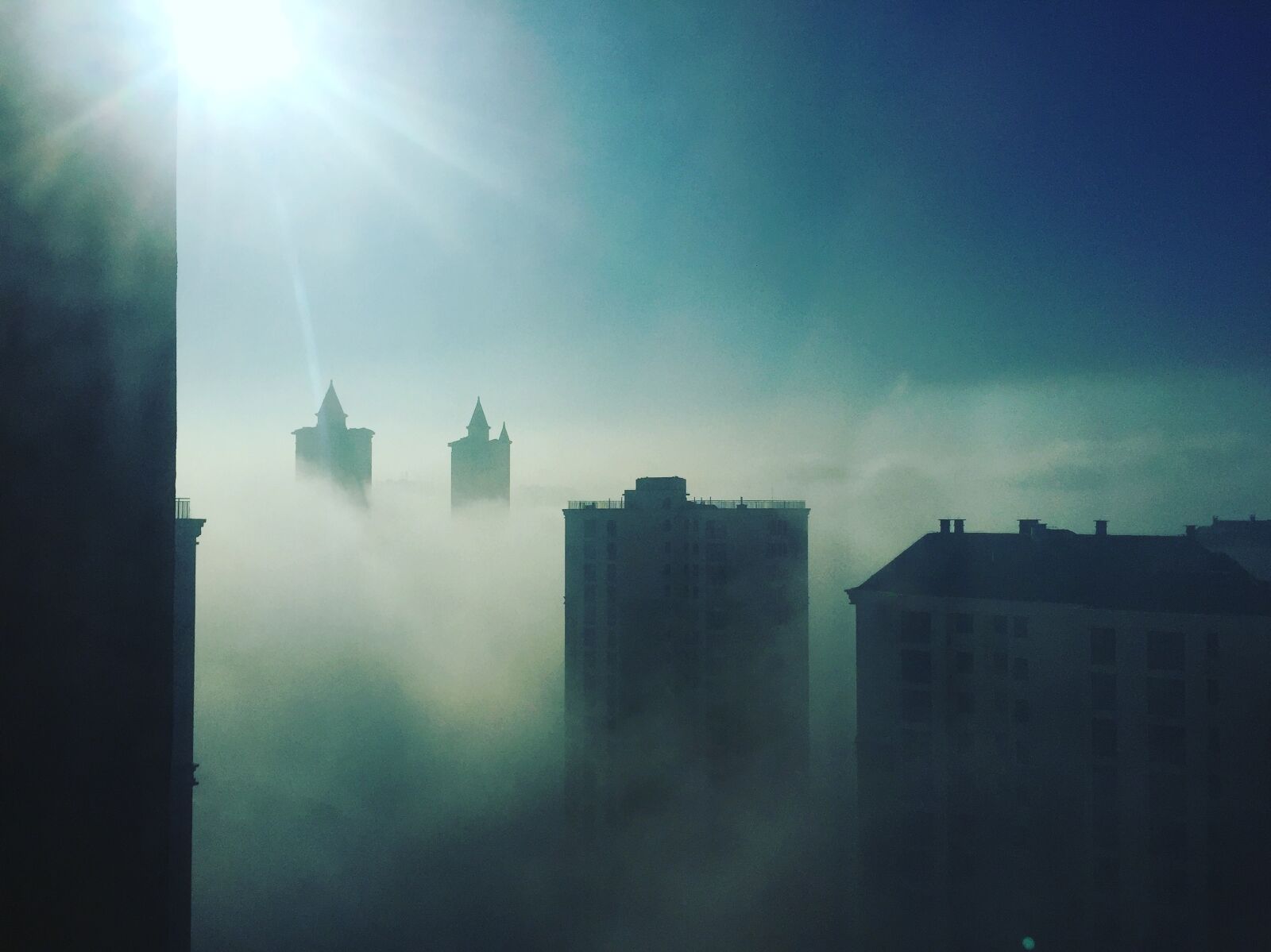 Apple iPhone 6 sample photo. Sunshine, haze, tall buildings photography