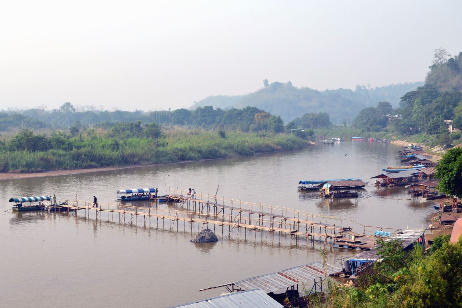 Nikon D3100 sample photo. River, boat, water, harbor photography