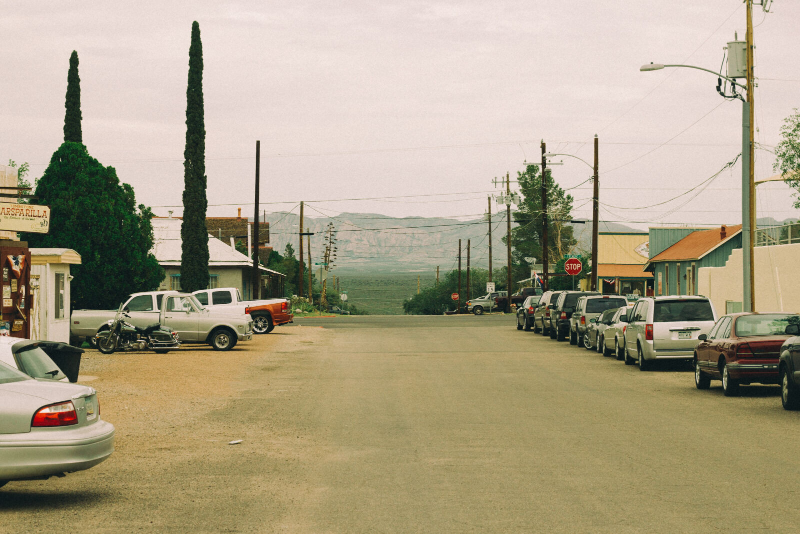 Canon EF 50mm F1.8 II sample photo. Asphalt, cars, city, downtown photography