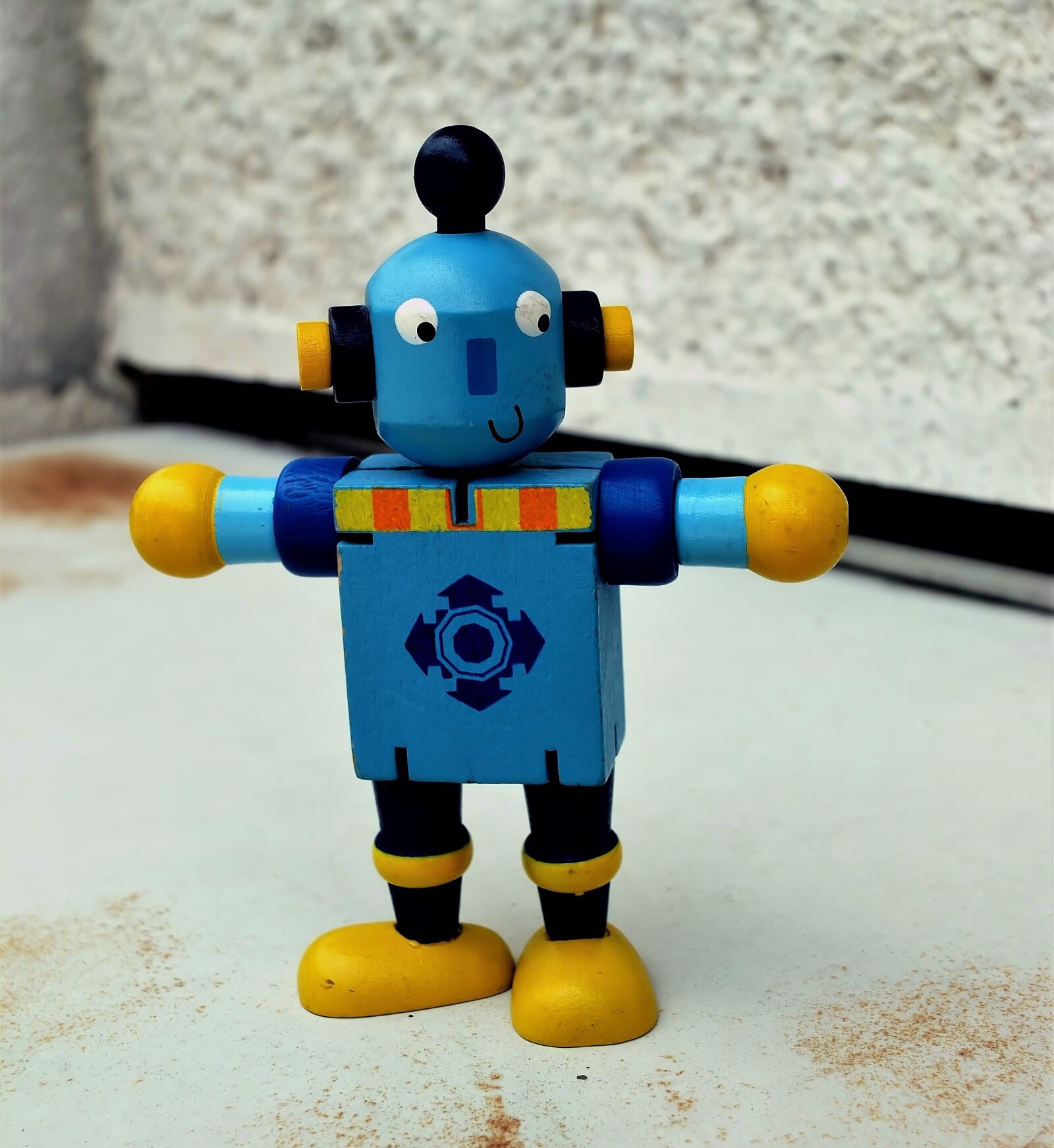 Fujifilm X10 sample photo. Toy, wooden, man photography