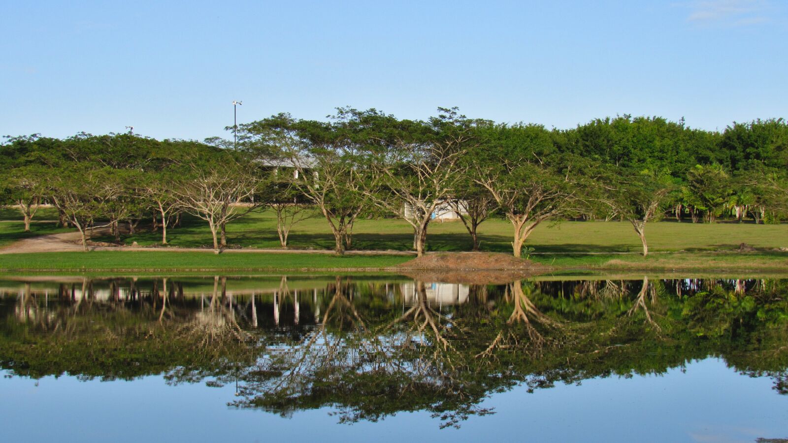 Canon PowerShot SX530 HS sample photo. Water, reflection, shore photography