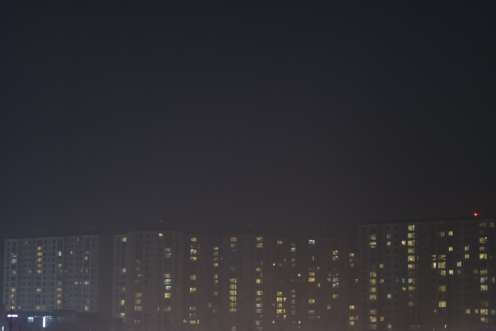 Nikon D3300 sample photo. Buildings, city, night, windows photography