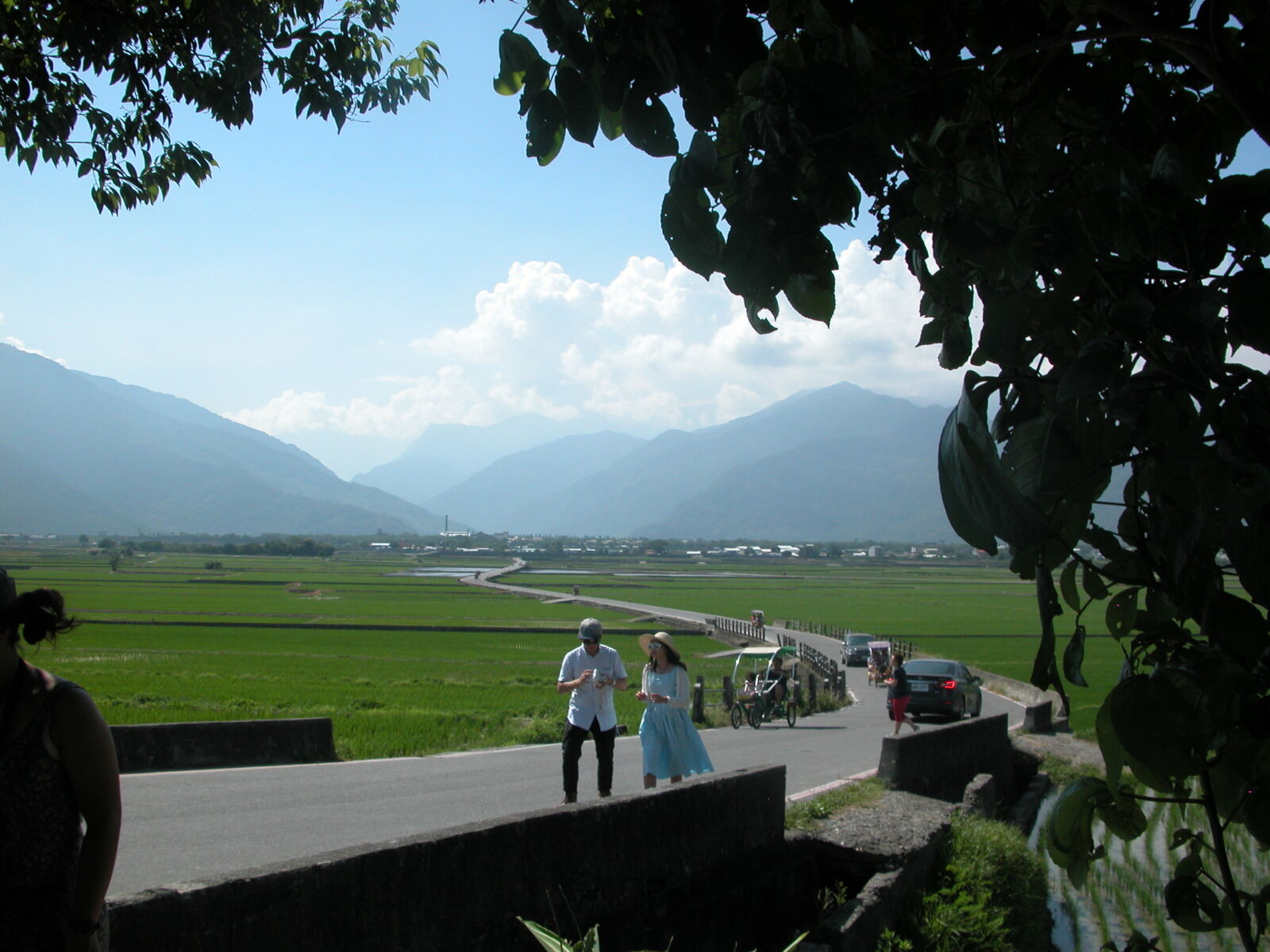 Nikon E5700 sample photo. Couple, mountains, rice, fields photography