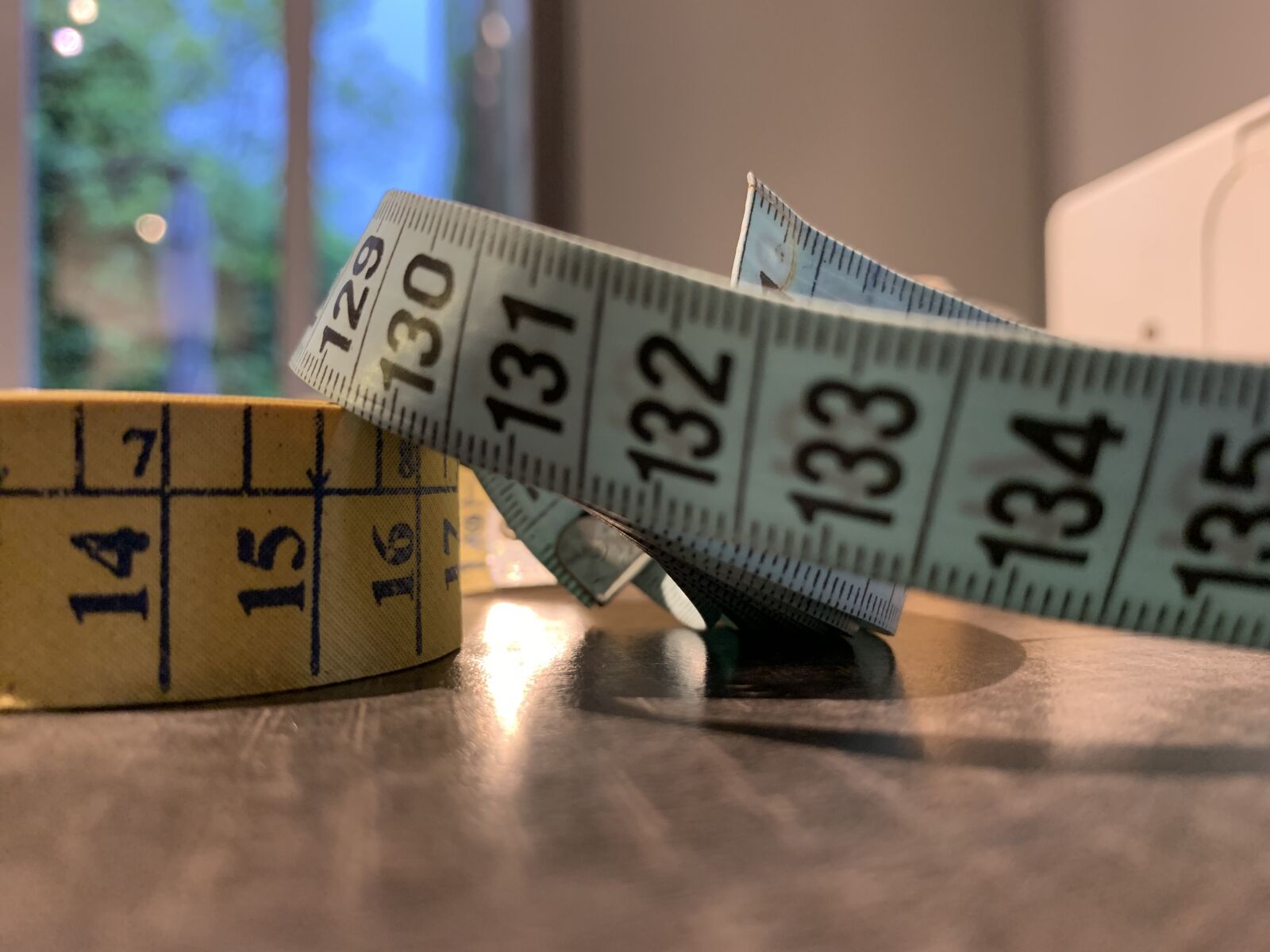 Apple iPhone XR sample photo. Metre, ribbon, measurement photography
