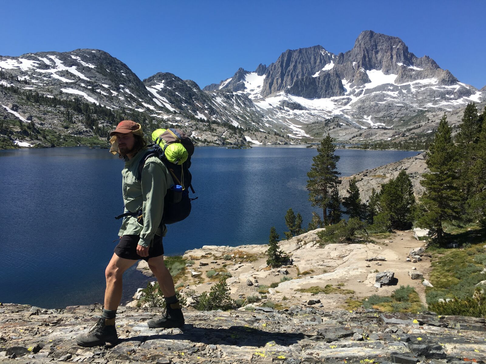 iPhone 6s back camera 4.15mm f/2.2 sample photo. Garnet lake, hiker, hiking photography
