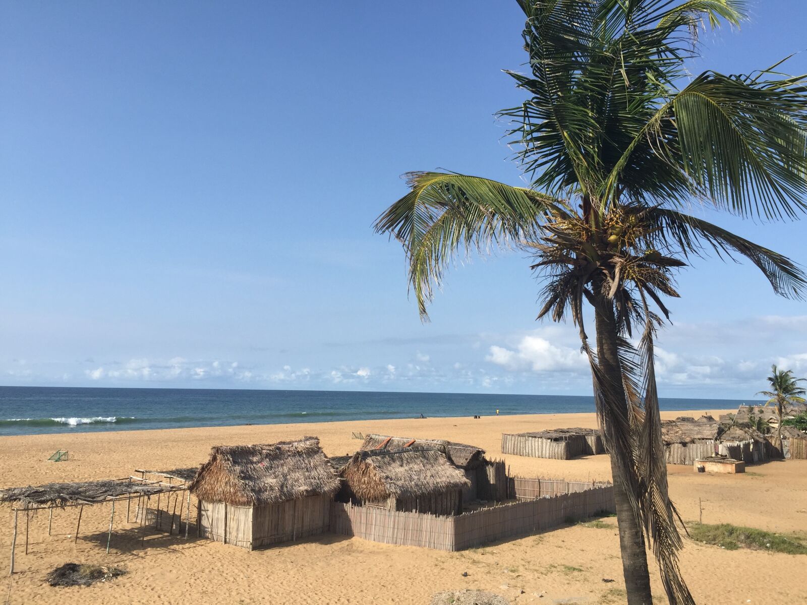 iPhone 6 Plus back camera 4.15mm f/2.2 sample photo. Beach, cotonou, huts, palm photography