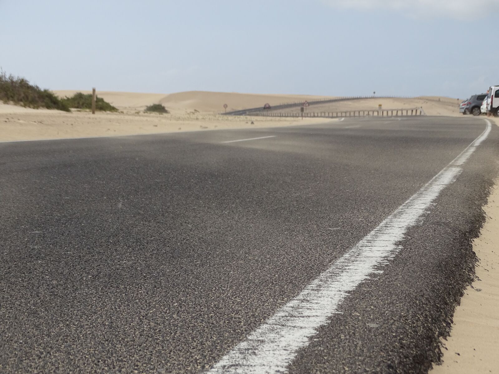 Sony Cyber-shot DSC-HX400V sample photo. Road, sand, wind photography