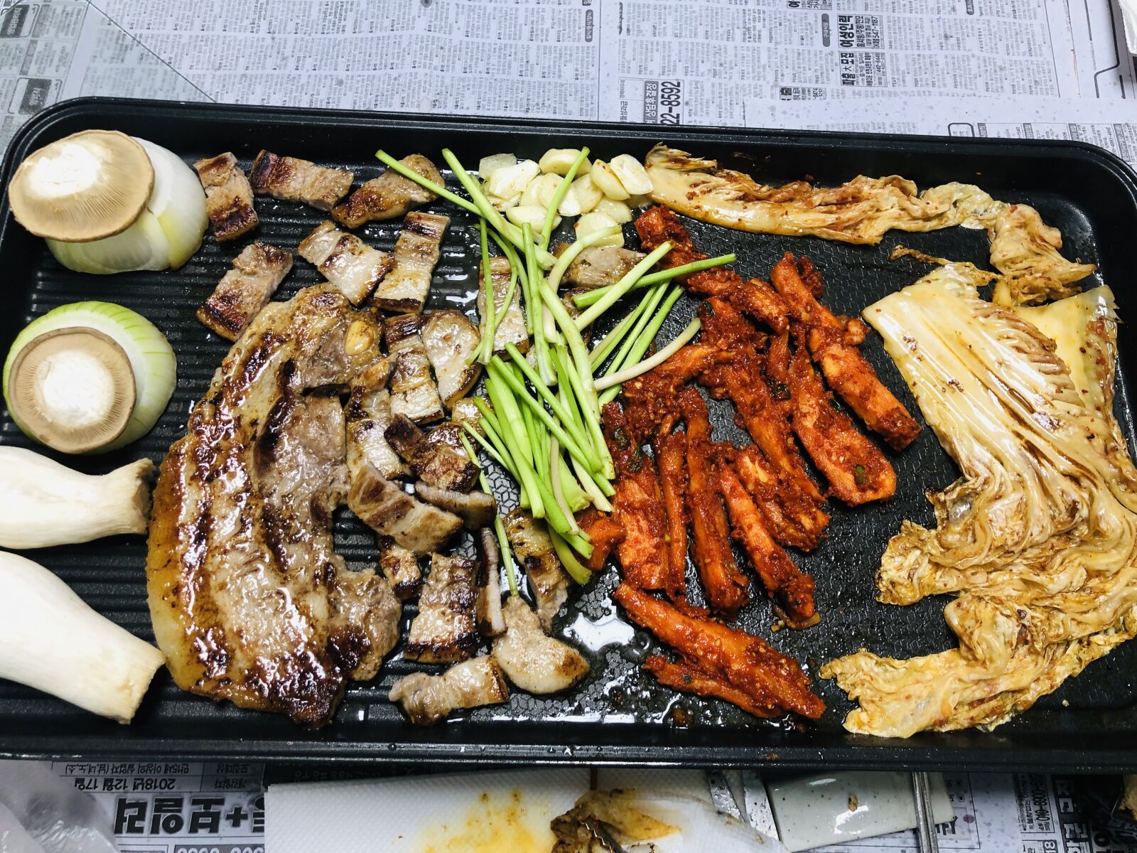 iPhone X back dual camera 4mm f/1.8 sample photo. Pork, grill, onion photography