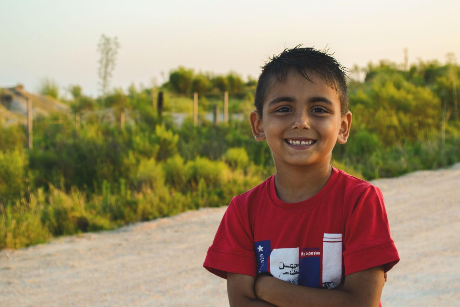 Nikon D3100 sample photo. Child, street, smile photography