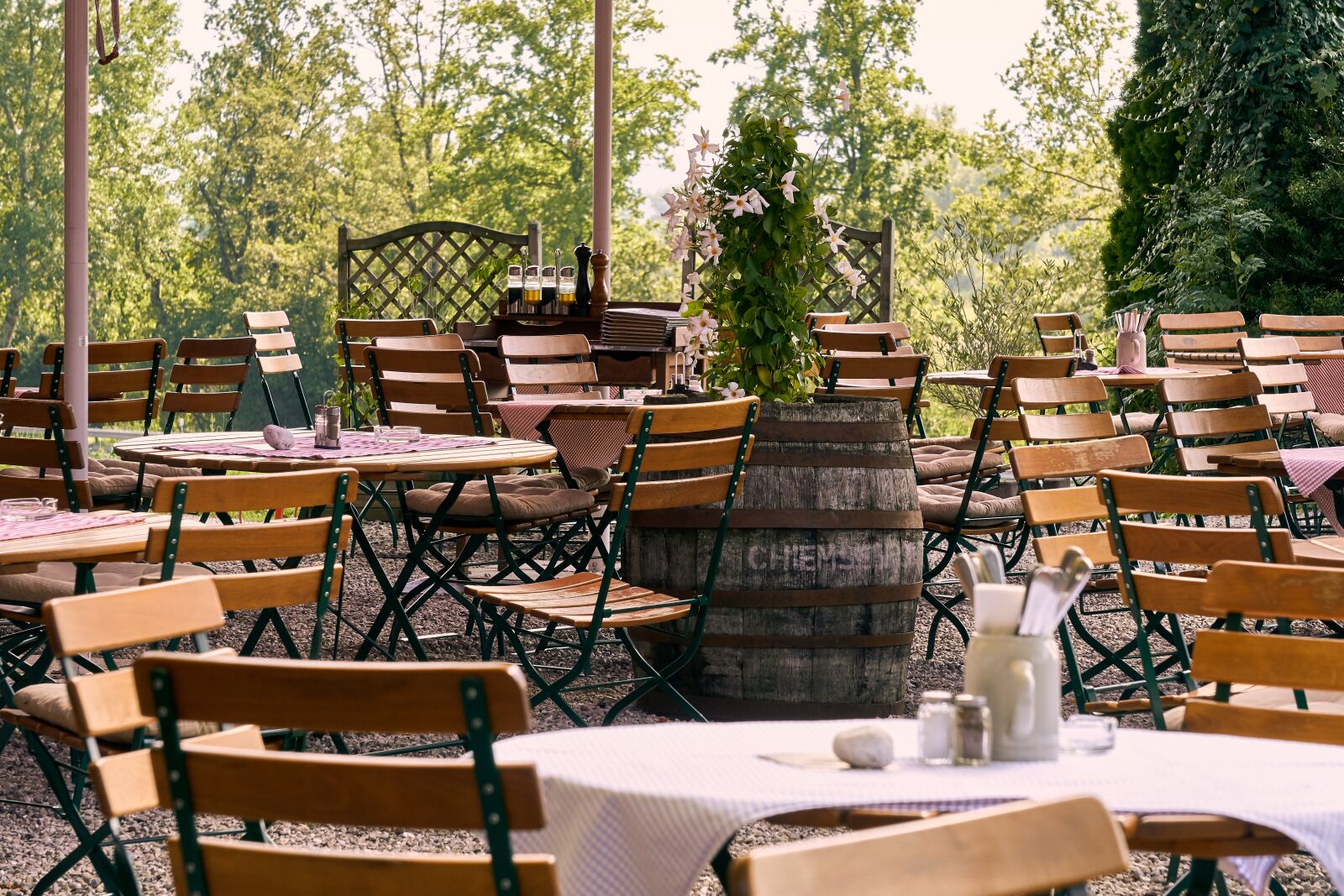 Sony E 55-210mm F4.5-6.3 OSS sample photo. Beer garden, chair, bistro photography