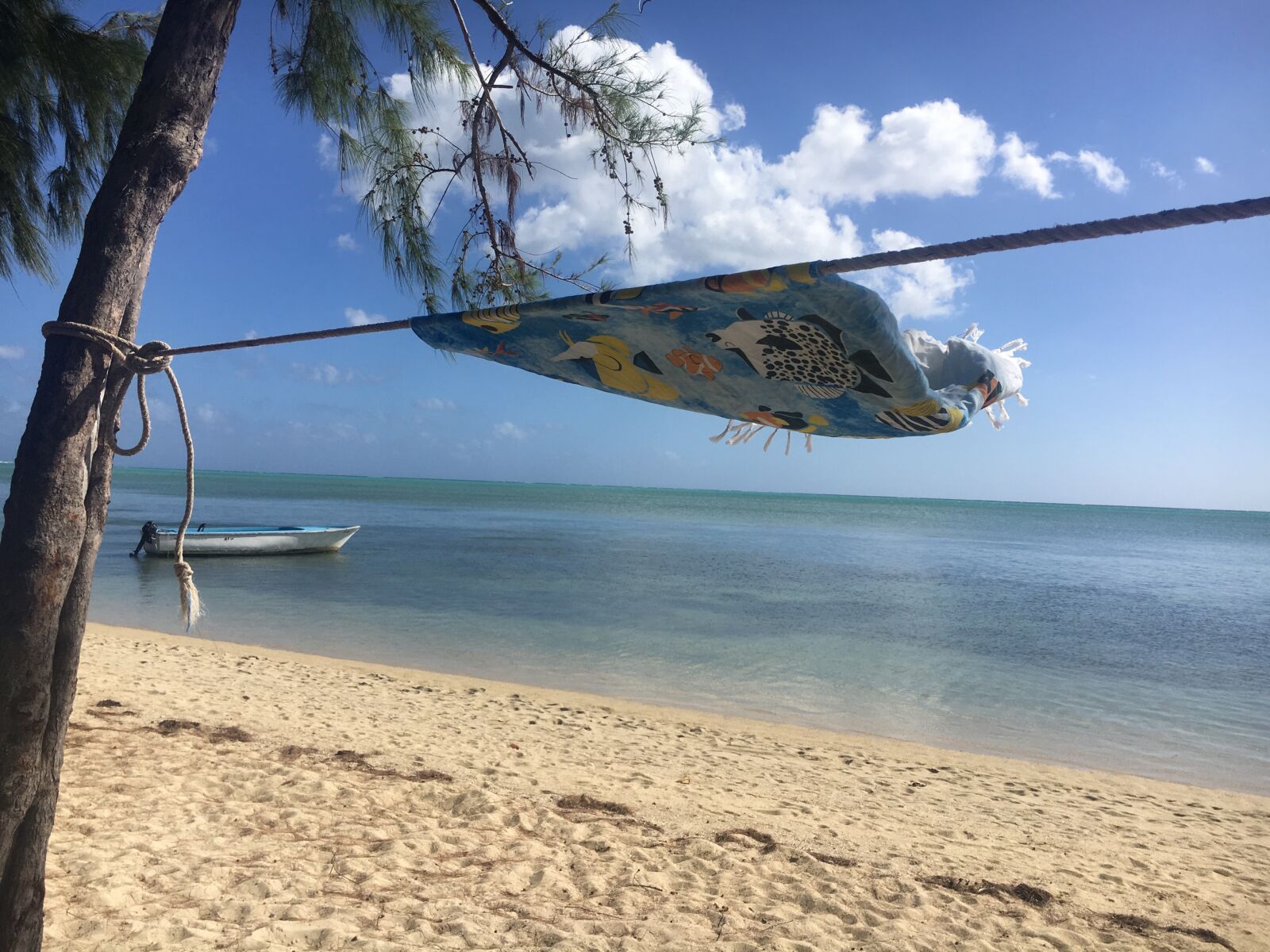 Apple iPhone 6s sample photo. Beach, boat, mauritius, towel photography