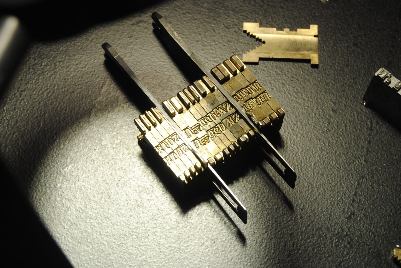 Nikon D3000 sample photo. Printing, setting by linotype photography