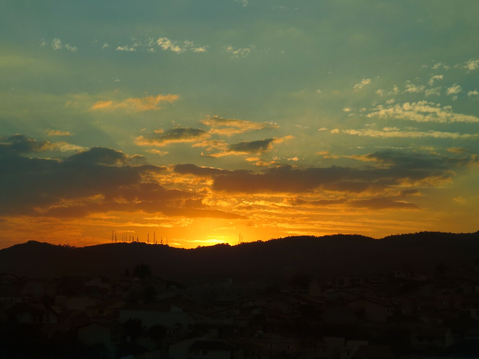 Canon PowerShot SX50 HS sample photo. Sunset, city, clouds photography