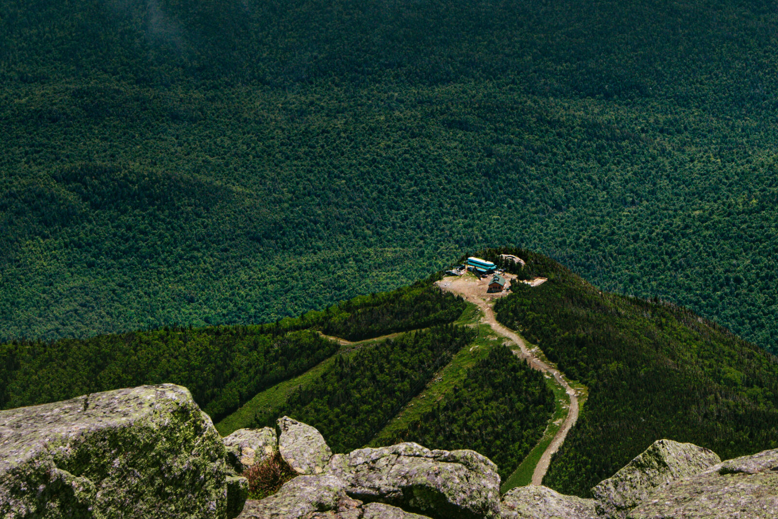 Canon EF 16-35mm F2.8L II USM sample photo. Road, landscape, summer, rocks photography